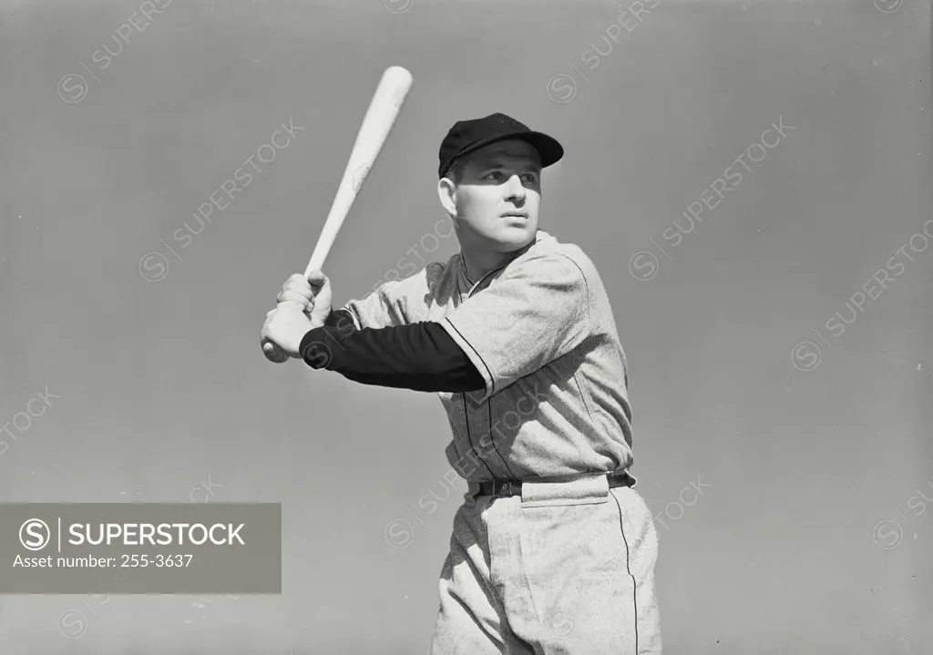 Vintage Photograph. Baseball player in uniform holding baseball bat waiting for pitch Frame 4