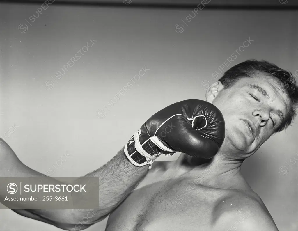 Vintage Photograph. Boxer being punched in face. Frame 3
