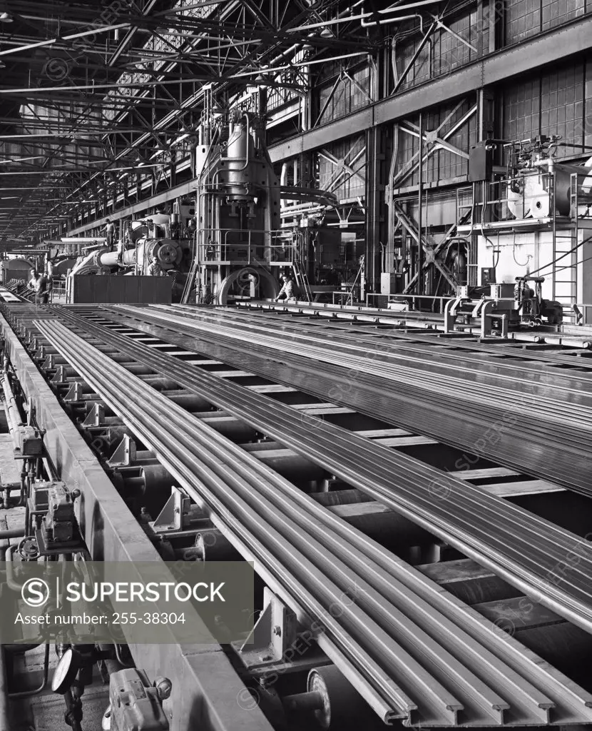 Magnesium beam on the conveyor belt in a factory