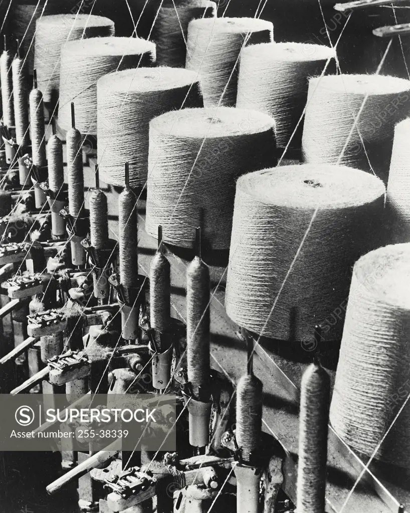 Vintage photograph. Cops - the filler thread balls that go into jacquard and velvet weaving shuttles
