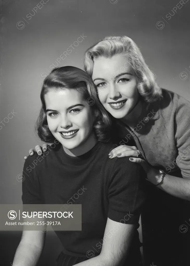 Vintage Photograph. Portrait of two women together. Frame 1