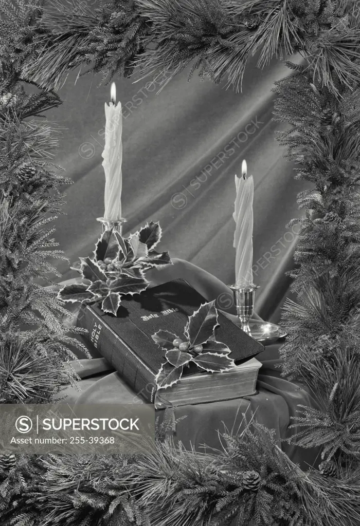 Vintage Photograph. Christmas scene with candles, holly, and bells. Frame 3