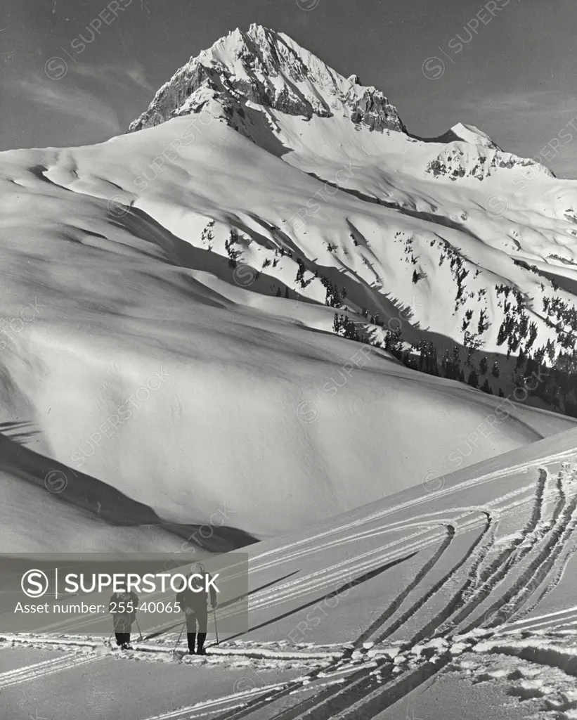 Vintage photograph. Skiing in Garibaldi Park with snow covered mountain in background