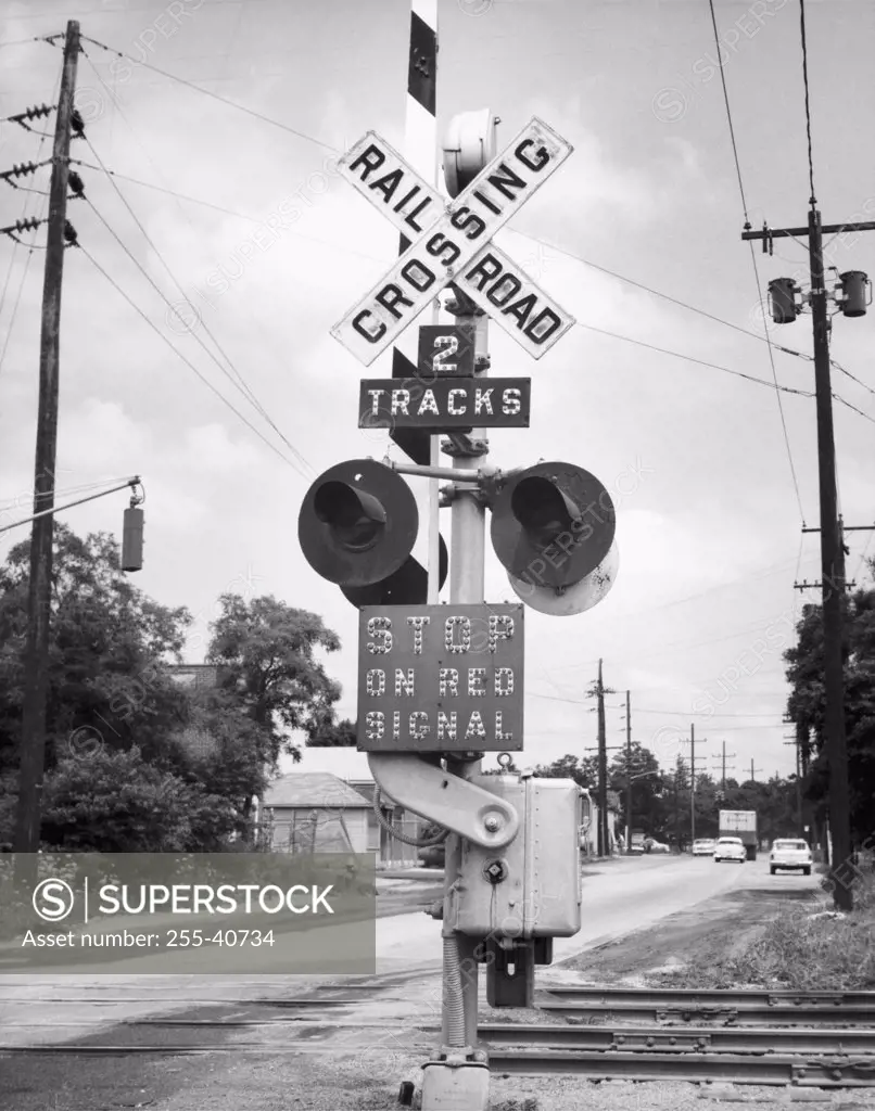 Railroad crossing sign at a railroad track