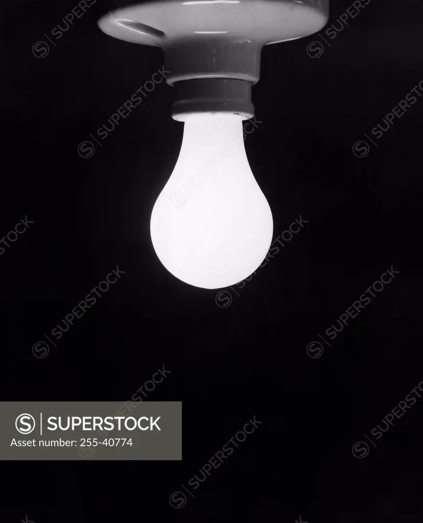 Close-up of a lit light bulb