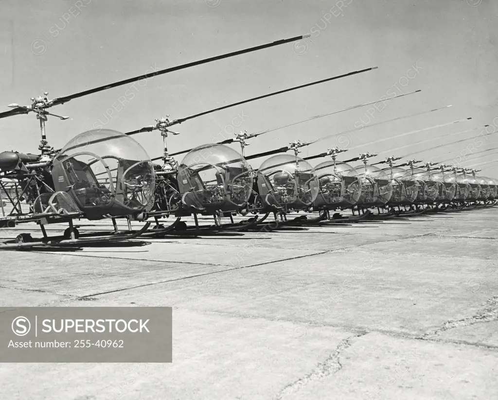 Vintage photograph. Bell H-13D helicopters lined up at Niagara Falls Airport prior to delivery to Armed Forces in Korea