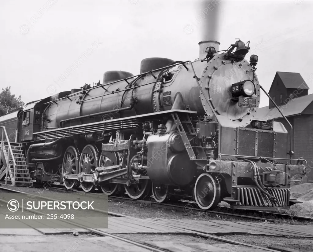 Steam train on a railroad track