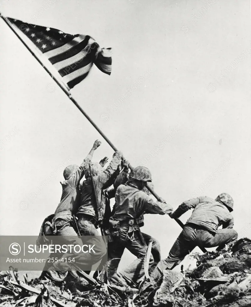 Vintage photograph. Army soldiers raising flag on mount Suribachi, Iwo Jima
