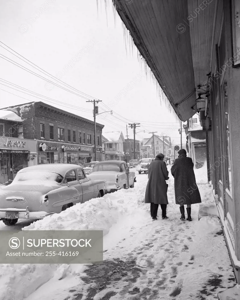 Pedestrians in snowy street
