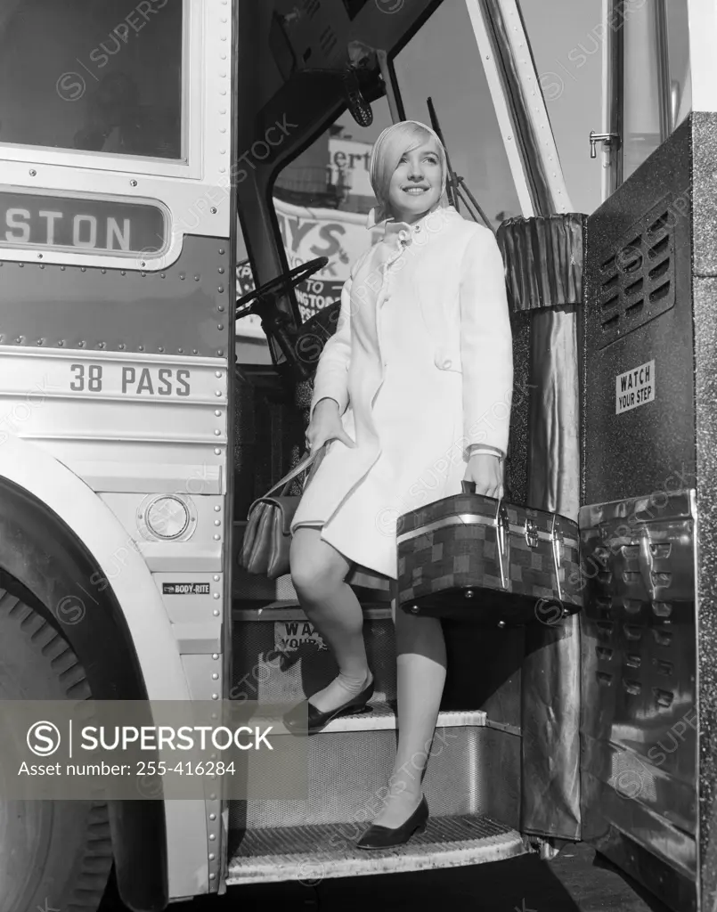 Woman going out from bus