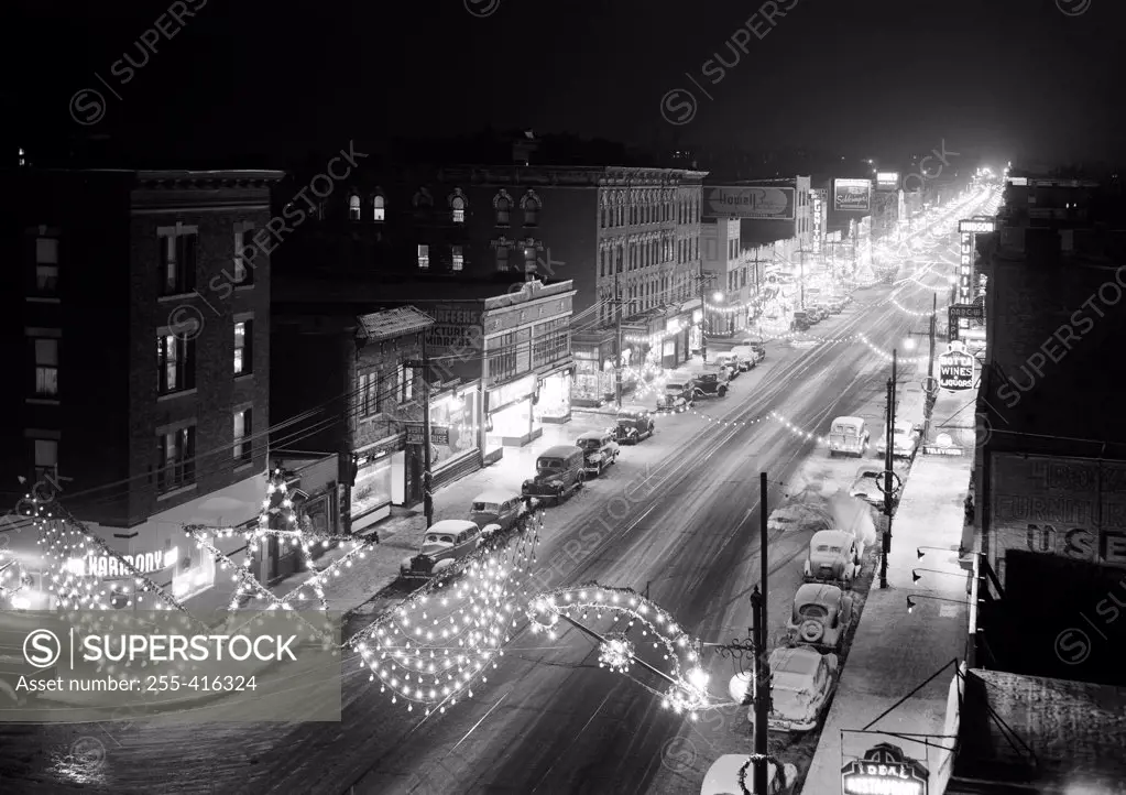 Elevated view of street with Christmas decorations at night