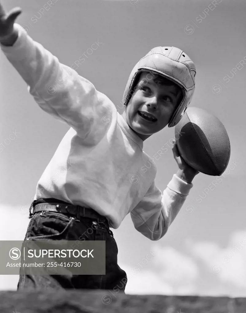 Boy playing American football