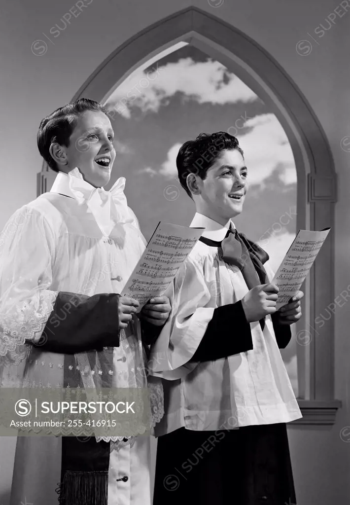 Altar boys singing in church