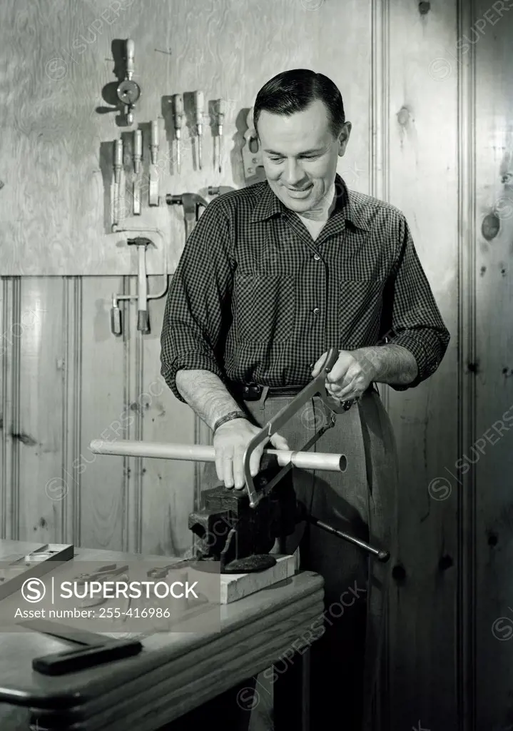 Man sawing