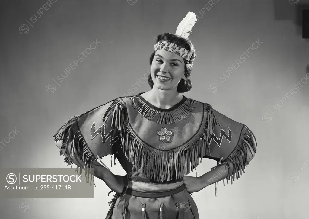 Vintage Photograph. Caucasian woman wearing Native American head dress. Frame 8