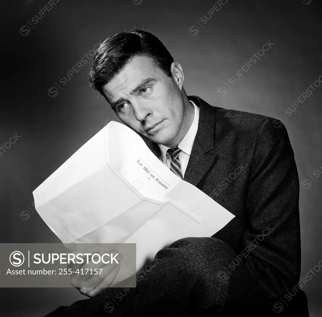 Businessman reading document