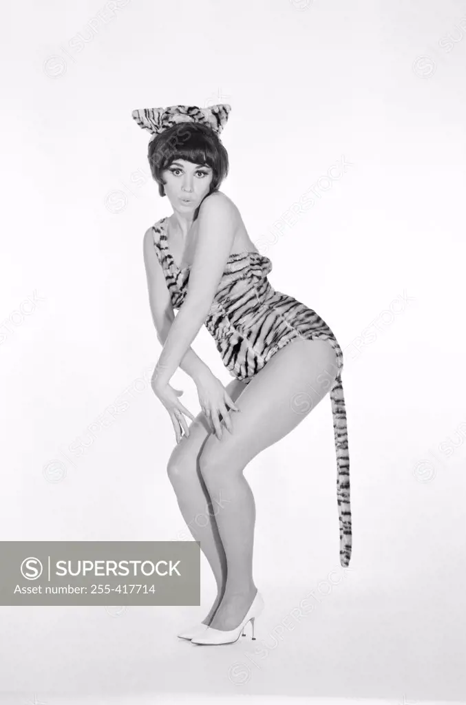 Portrait of pin-up girl dressed-up as tiger