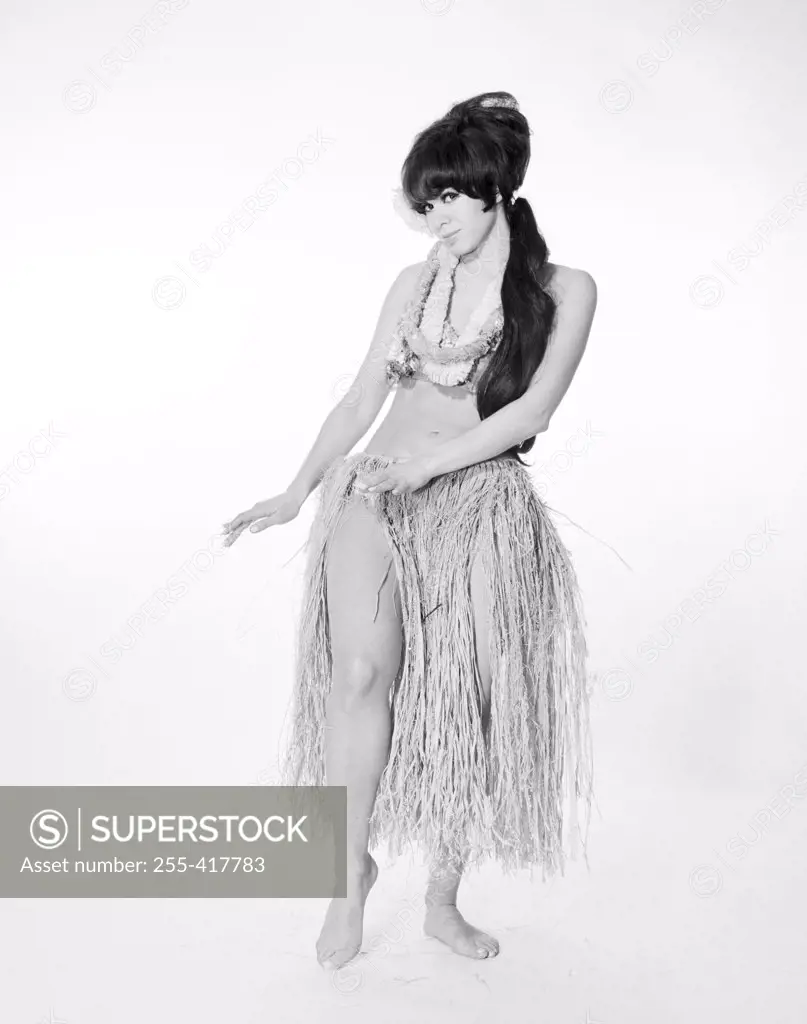 Young woman hula dancing