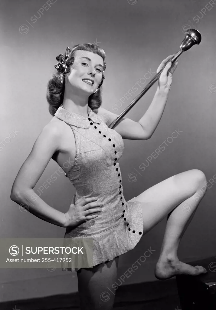 Pin-up girl with stick
