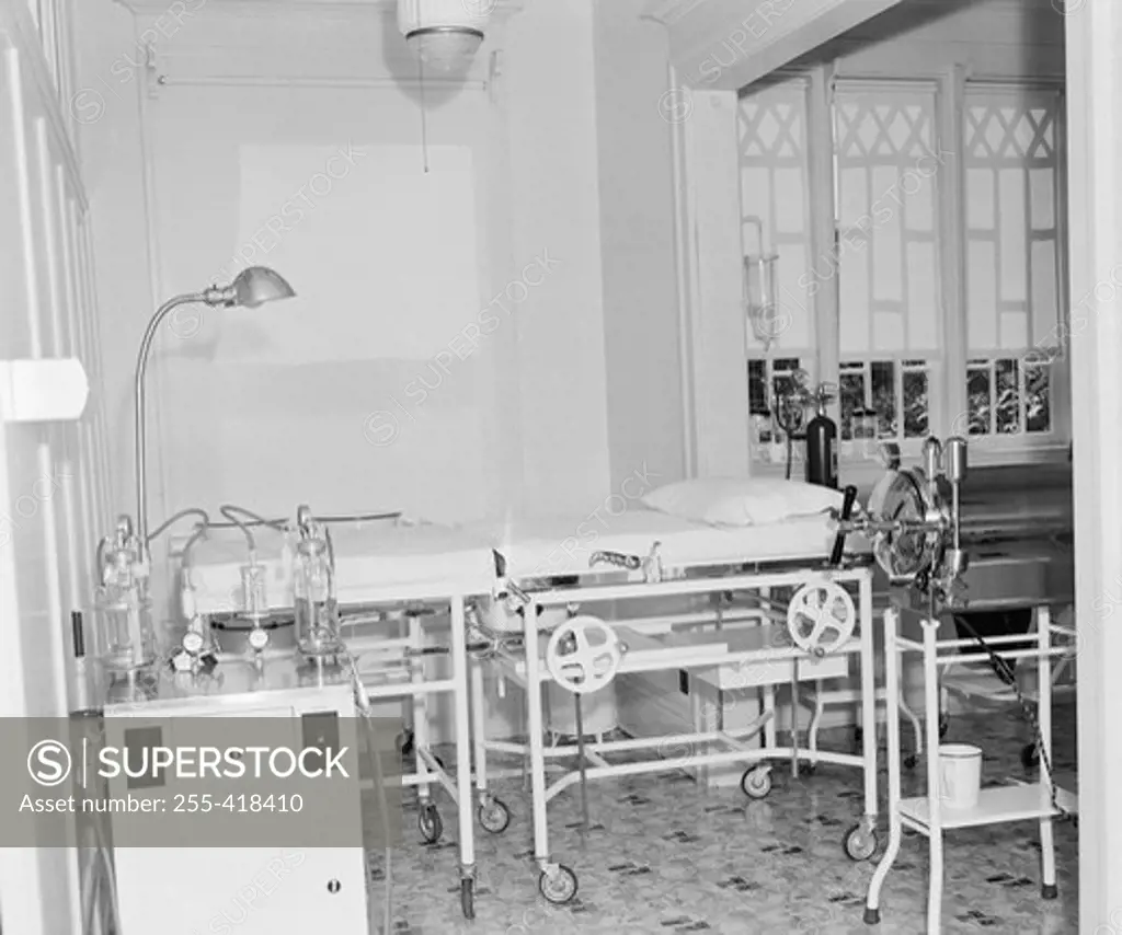 Empty hospital ward with medical equipment