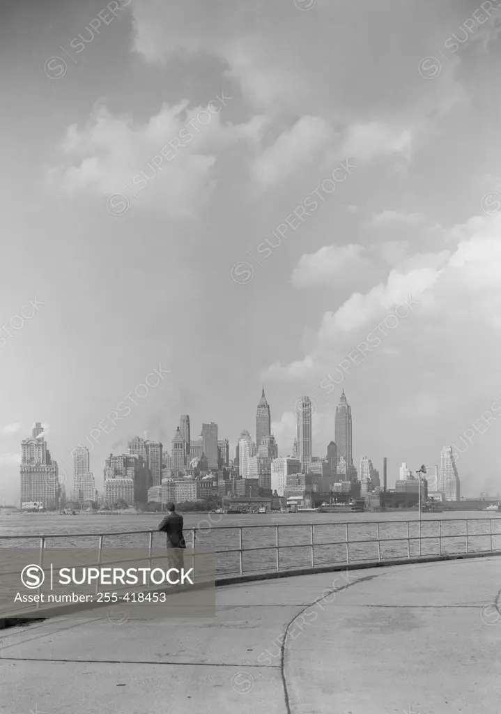 USA, New York, New York City, Manhattan skyline seen across East River