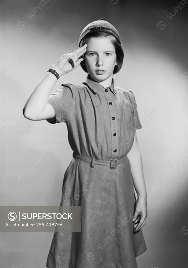 Girl scout saluting