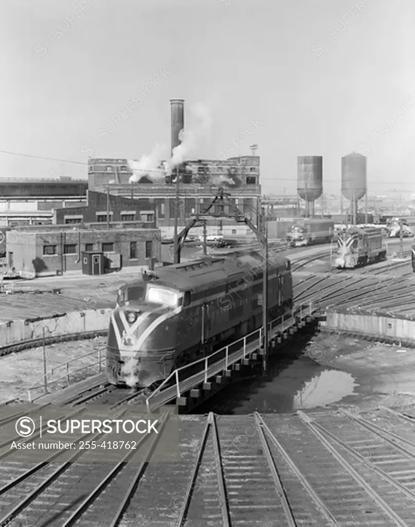 USA, New York, Jersey Central diesel engine on turntable in railroad yard