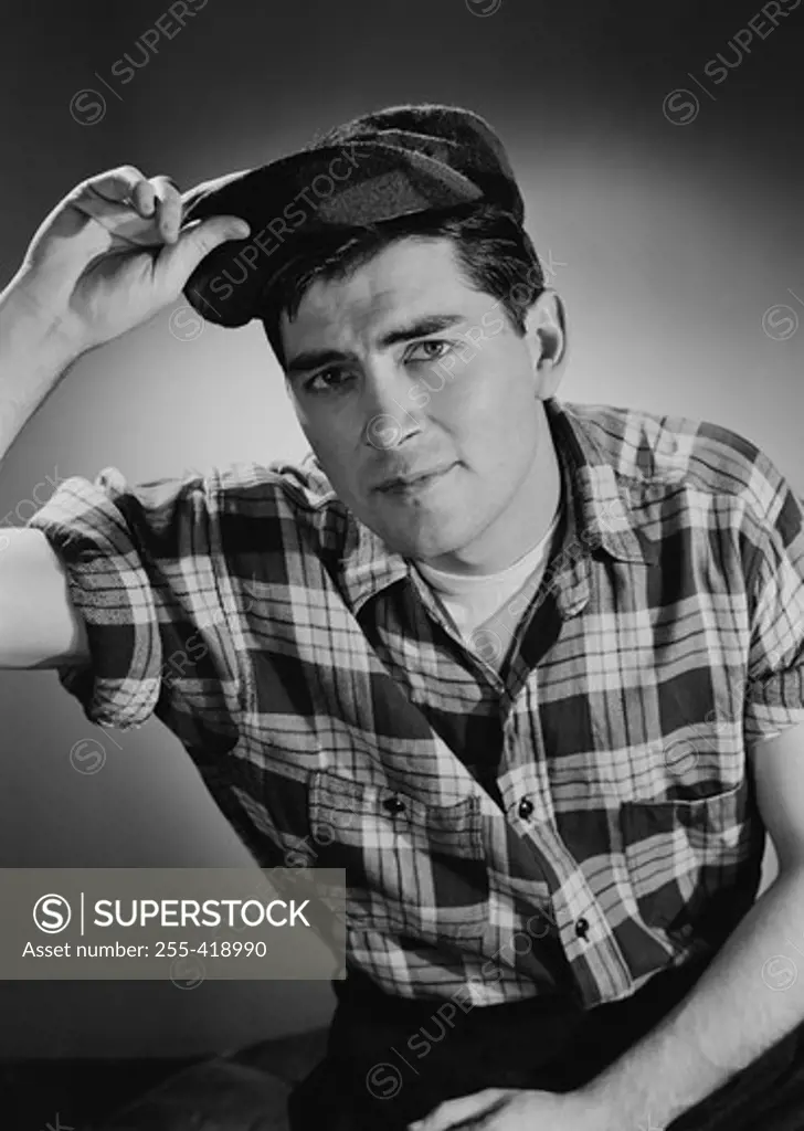 Portrait of young man in checked shirt