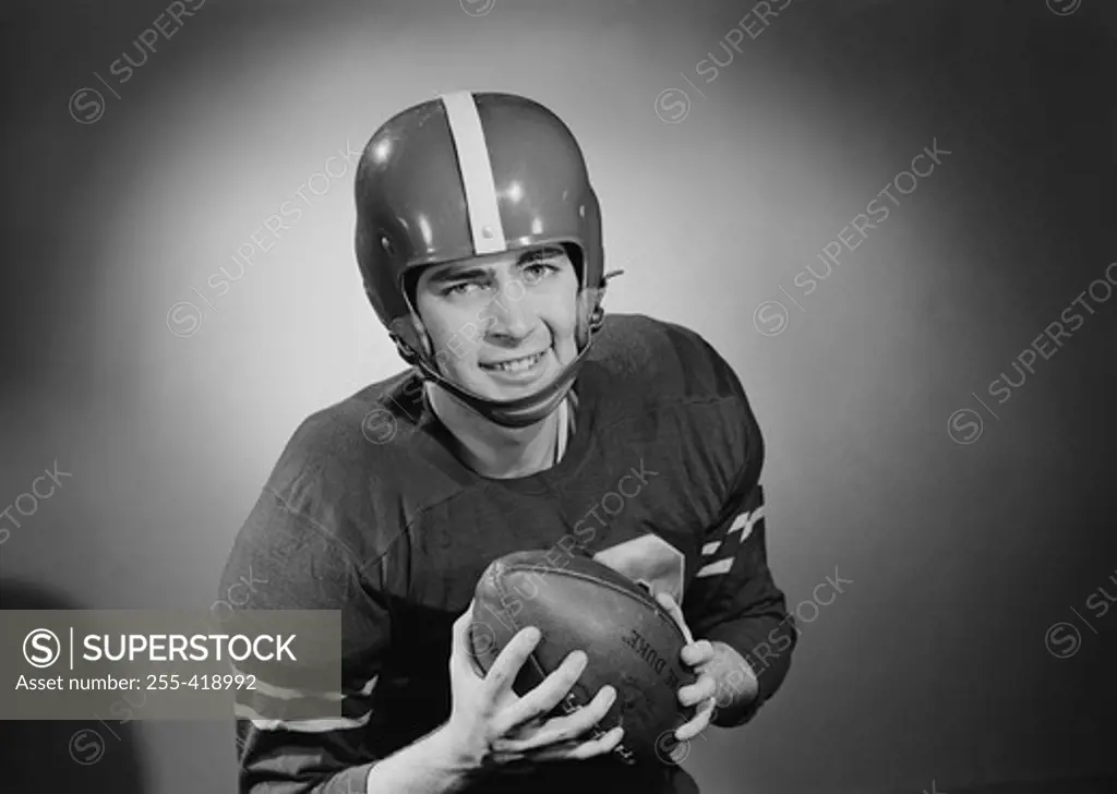 Portrait of young football player