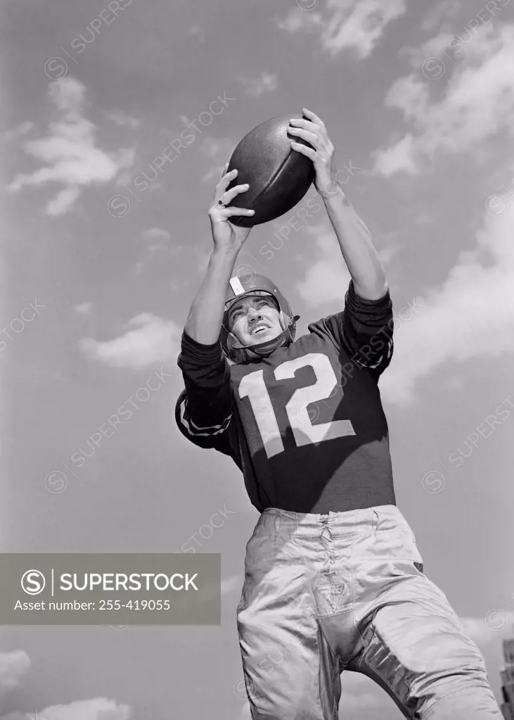Low angle view of american football player