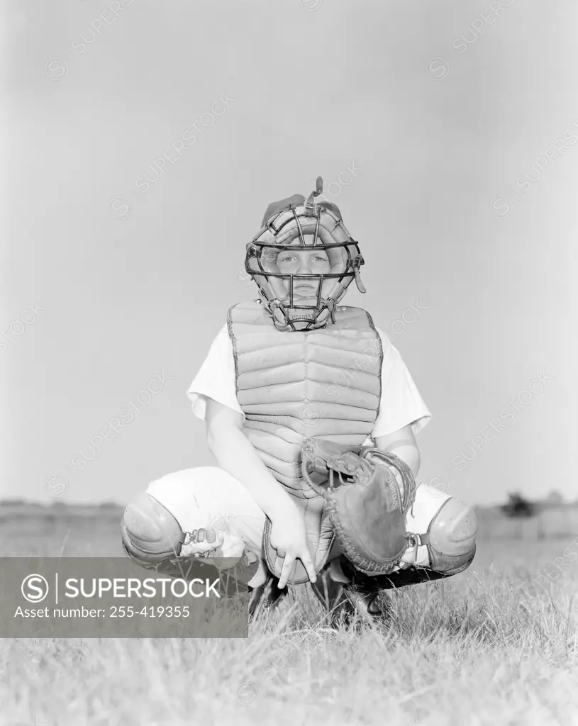 Baseball catcher waiting for ball