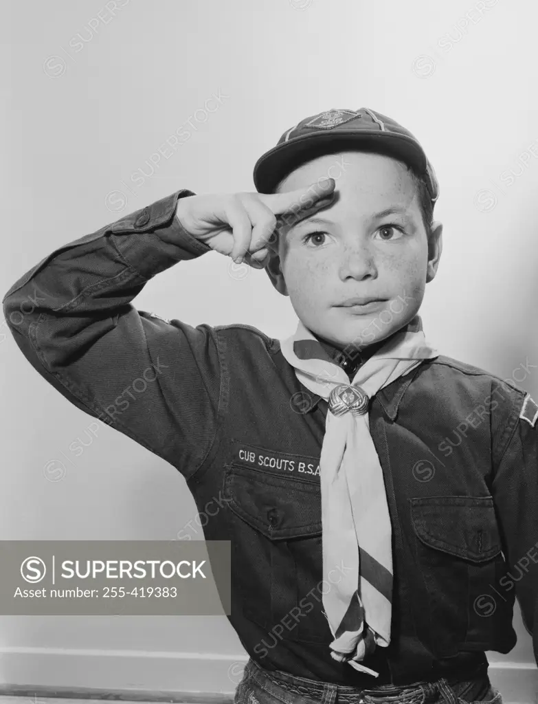 Boy scout saluting