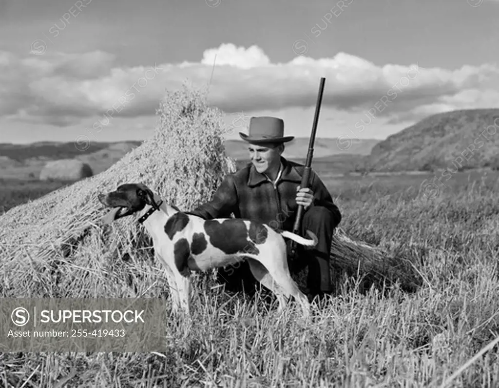 Man hunting with hunting dog