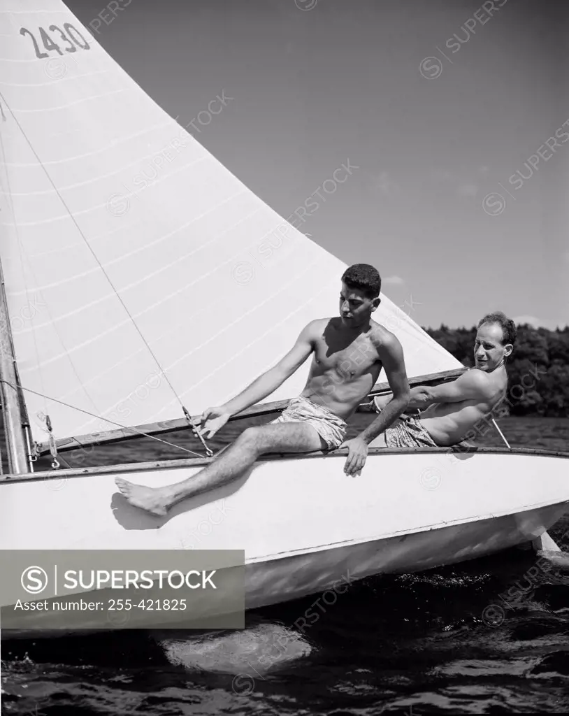 Two men on sailboat