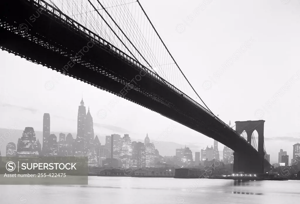 USA, New York City, New York skyline with Brooklyn Bridge