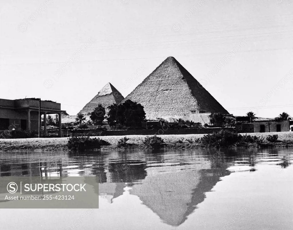 Egypt, Giza, Giza Pyramids reflecting in river