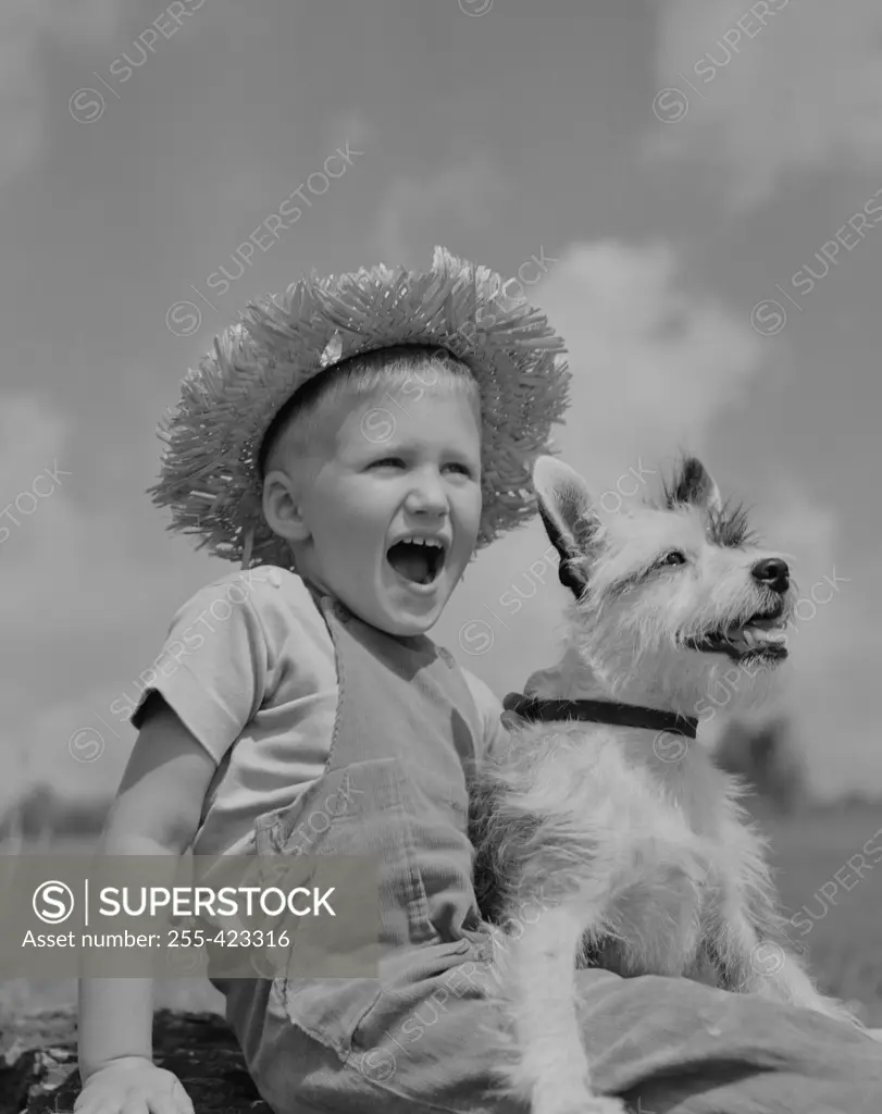 Boy with terrier dog