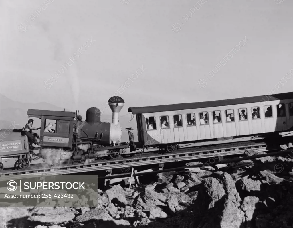 USA, New Hampshire, Model Cog Railway train approaching Mount Washington summit