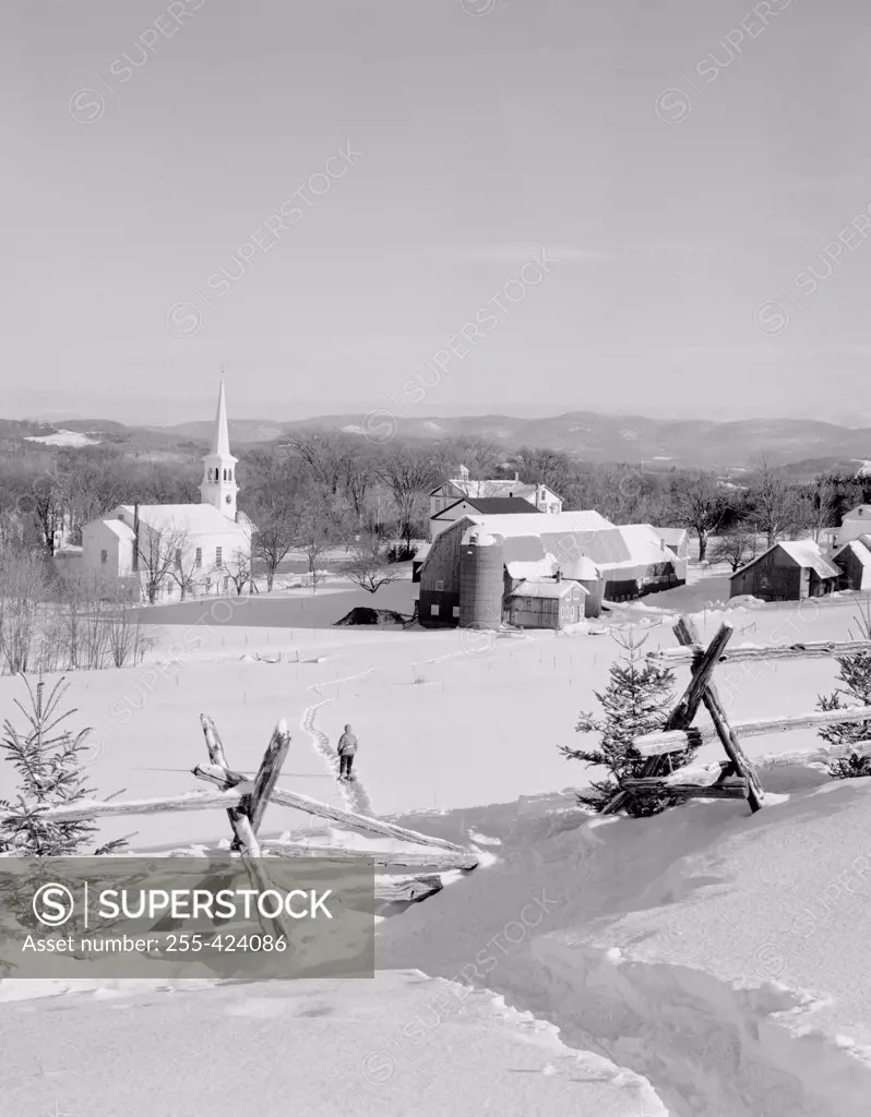 USA, Vermont, Peacham, winter farm and church