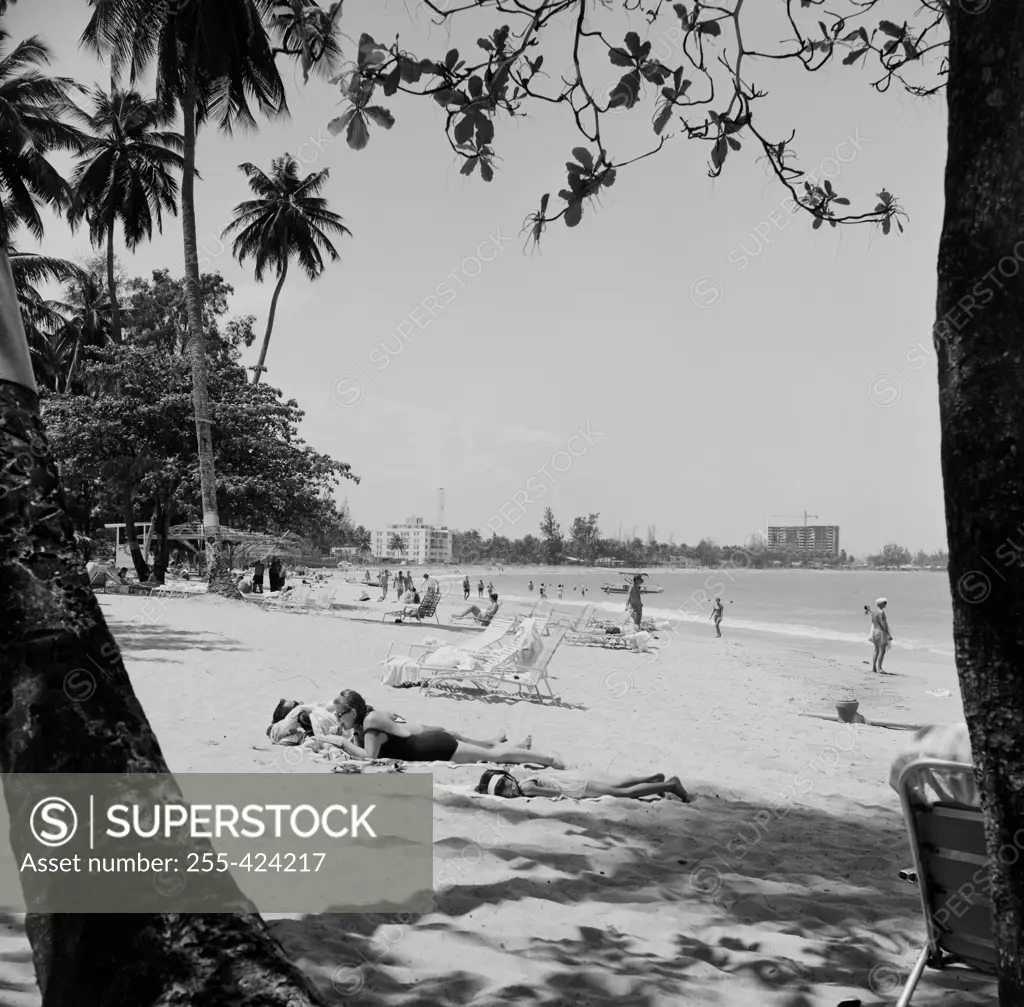 Puerto Rico, Isla Verde, People relaxing on beach