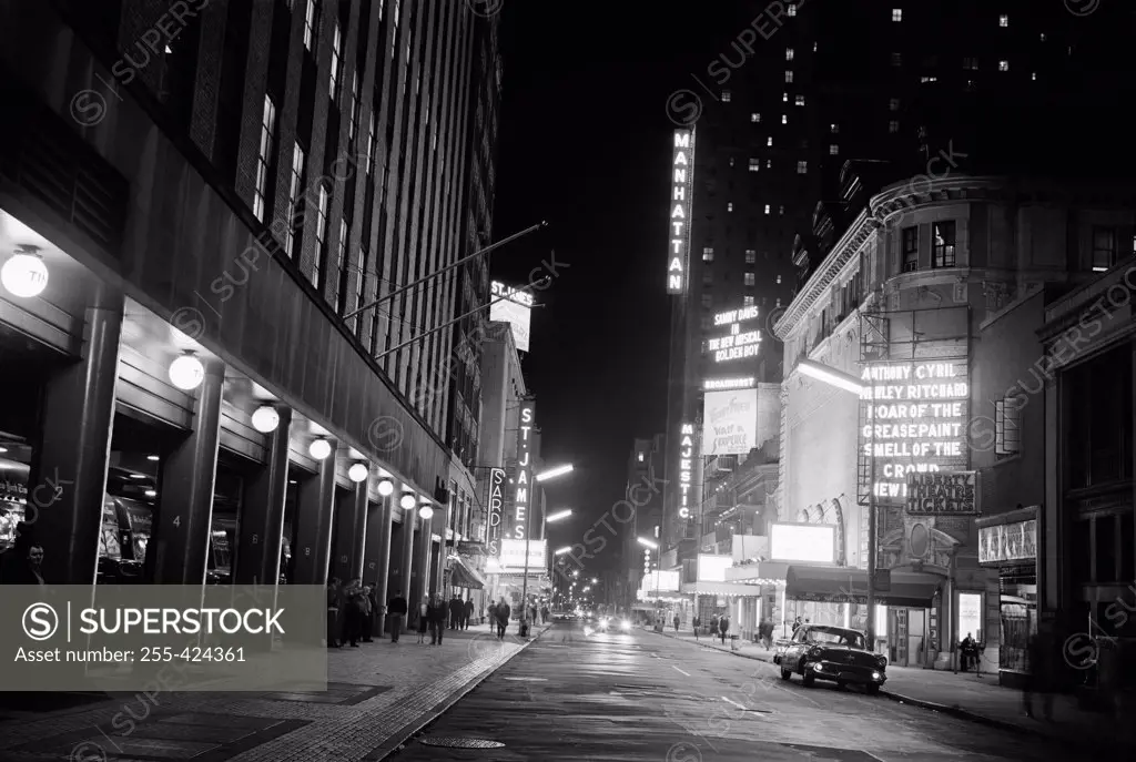 USA, New York City, 44th Street, Theatres illuminated at night
