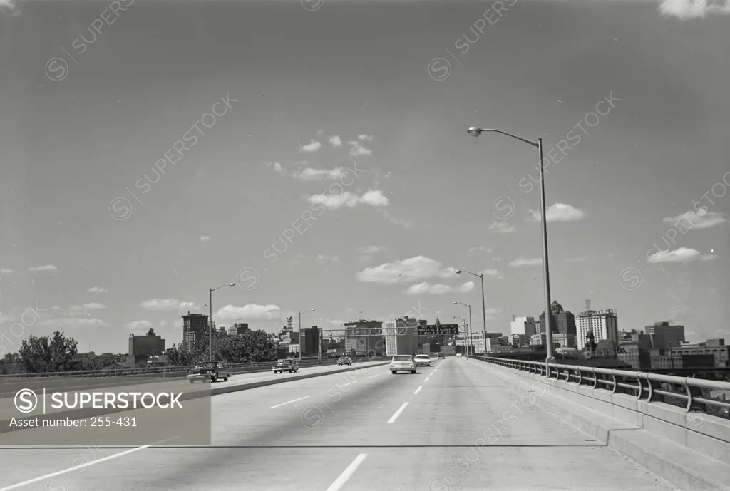 Vintage Photograph. The Richmond-Petersburg Turnpike with the skyline of Richmond in the background. Frame 2