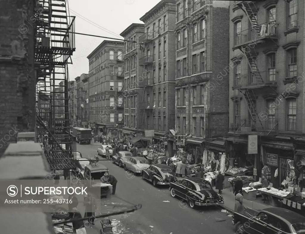 Vintage photograph. Looking north on Orchard Street showing the sidewalk peddlers shouting their wares, New York City