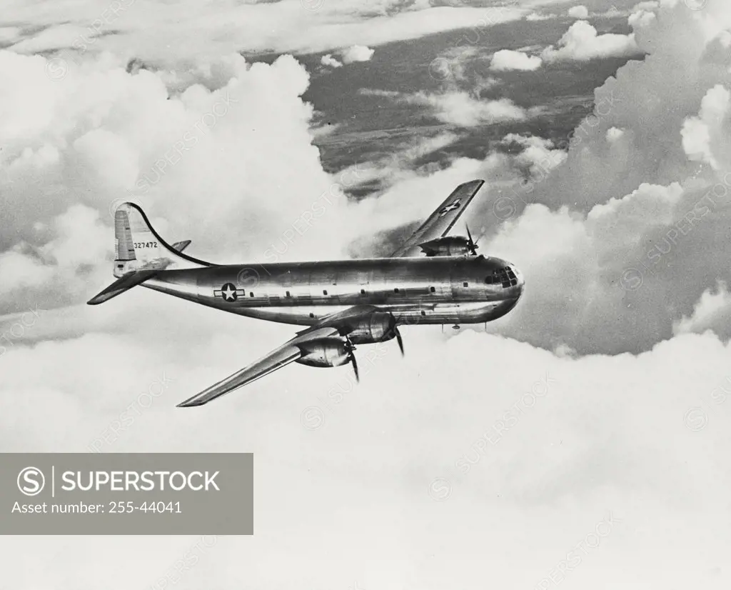 Vintage photograph. Boeing Stratocruiser in flight , "blood brother" of the famous Boeing B-29 Superfortress. Four engine, 80 passenger double decker commercial air transport plane