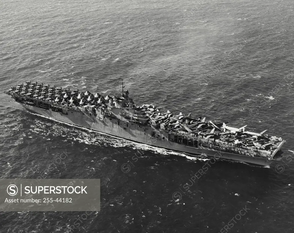 Vintage photograph. High angle view of a military ship in the sea, USS Valley Forge (CV-45)