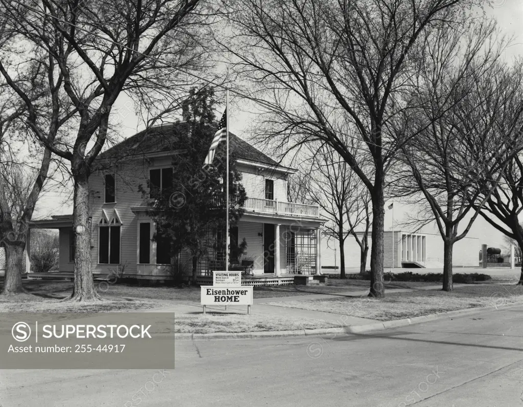 Vintage Photograph. Flag in front of a house, Dwight D. Eisenhower Family Home, Abilene, Kansas, USA