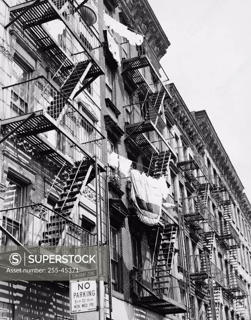 Low angle view of fire escapes of buildings, Bowery, Manhattan, New York City, New York, USA