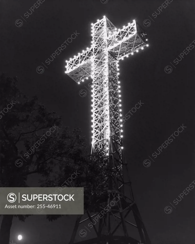 Low angle view of a cross lit up at night, Mount Royal, Montreal, Canada