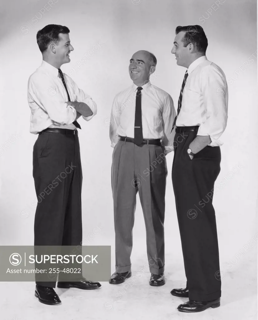 Three businessmen talking