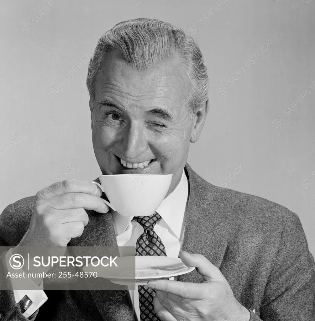 Portrait of a mature man drinking coffee